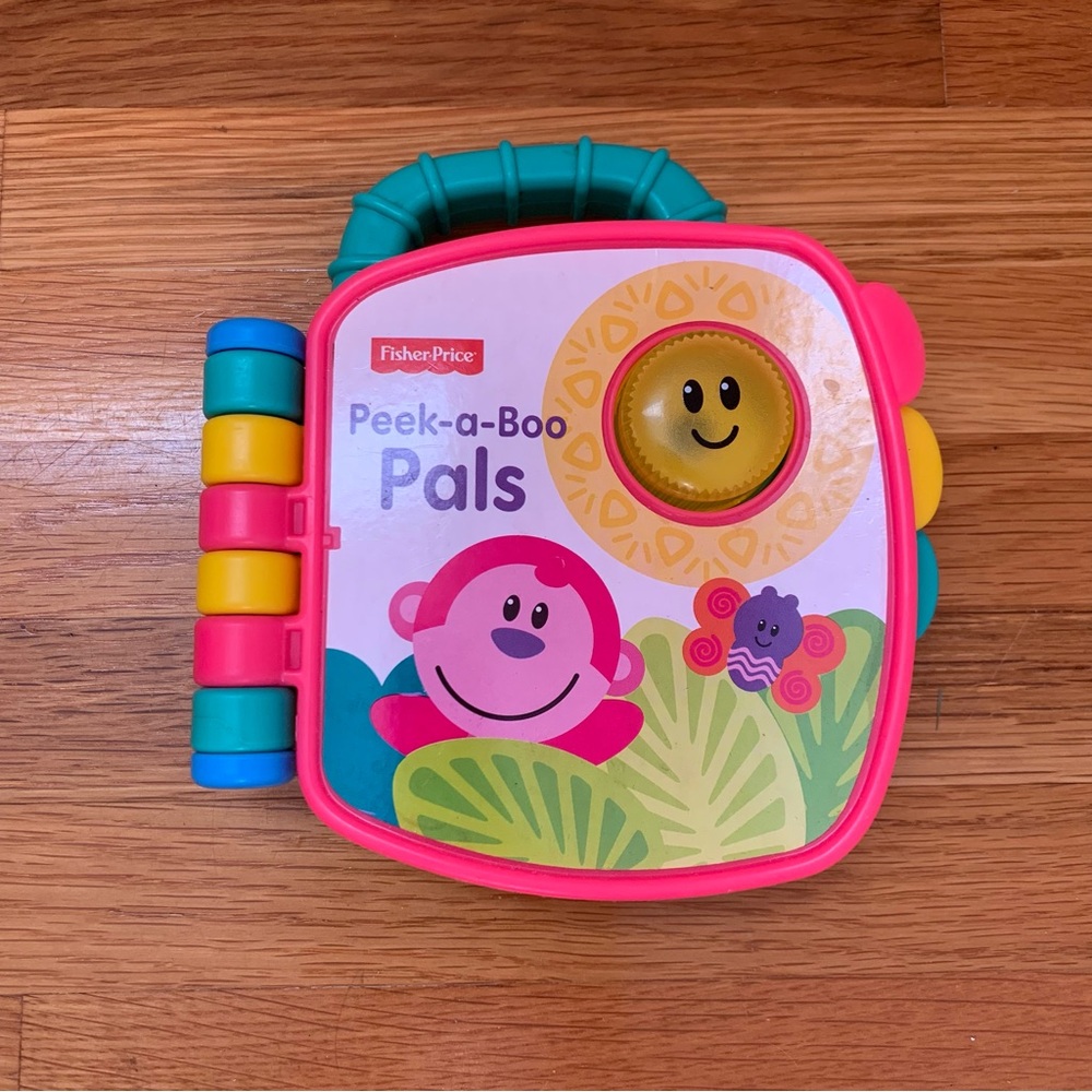 Fisher-Price Colorful Musical Safari Animal Peek-a-Boo Baby Book Learning Toy